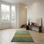 Bespoke luxury prayer rug featuring a striking two tone design on a wooden floor