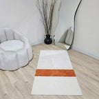 Bespoke two tone mat with a prominent contemporary pattern centre
